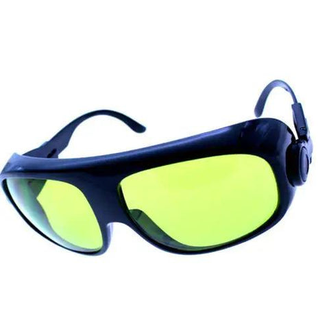 Heavy Duty Laser Protective Eyewear Delivering Rock Solid Shield Against 808Nm 1064Nm And 10600Nm Energy With Crystal Clear Views And Hella Comfy Adjustable Straps For Serious Daily Work Use, featuring green lenses and black frame.