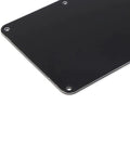 Close-up of black Electric Guitar Back Plate Cover with 6-hole plastic cavity backplate closed style for repair and refit.