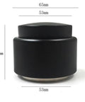 Real Deal Espresso Coffee Distributor With Quick Rebound Action And Durable Stainless Steel Build, black and silver design, 65mm height.