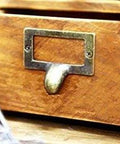 Wooden drawer with 20 Pack Antique Bronze Zinc Alloy Label Frame Drawer Pull, vintage industrial style, close-up view