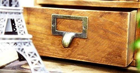 Wooden drawer with 20 Pack Antique Bronze Zinc Alloy Label Frame Drawer Pull, vintage industrial style, close-up view