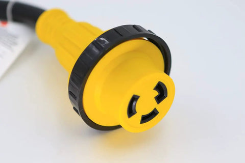 Close-up of yellow 30 Amp RV To Household Power Adapter Dogbone Twist Lock To 15 Amp 110 Volt Converter cord end with twist-lock clasp