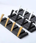 Next Level Wall Mounted Coat Hooks Solid Aluminum Robe Rack Quick Snap Install featuring black and metallic gold hooks for easy access.