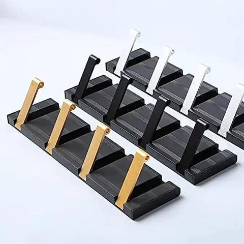 Next Level Wall Mounted Coat Hooks Solid Aluminum Robe Rack Quick Snap Install featuring black and metallic gold hooks for easy access.
