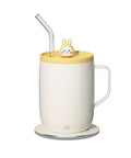 Cordless Smart Coffee Mug Warmer Plate With Digital Temperature Control Keeps Your Morning Brew Dialed In And Piping Hot Great For Office Desks Or Road Trips Say Goodbye To Sad Lukewarm Sips Always, white mug with yellow lid and straw.
