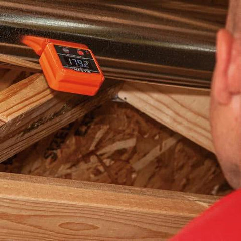 Klein Tools 935DAG digital level installed on wooden framing; orange gauge displays 179.2°