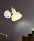 Modern Plug In Wall Sconce Featuring Adjustable C Shade And Easy Peasy Mount Kit with white shade and brass details.