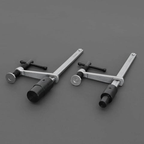 Two Quick Acting Desktop Hold Down Clamps For Woodworking Benches And Tables, suitable for 16mm and 28mm holes, side view.