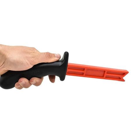 Hand holding Plastic Magnetic Push Stick with Ergonomic Black Handle and Red Shaft for Safer Table Saws Routers and Jointer Work