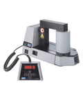 Front view of SKF TIH 100M/230V induction heater with timer and temperature control, gray unit with wired control panel