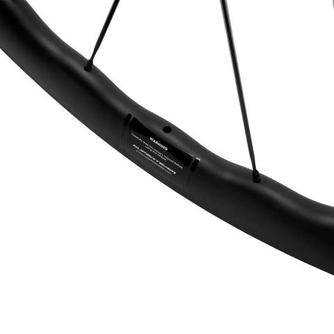 Tubeless Carbon Road Wheelset 45 50 65mm Deep 700c Clincher 25mm Width Toray T700 UD Matte Finish EN Quality Tested Shimano 8 9 10 11 Speed Compatible V Brake Road Use - close-up of rim detail.