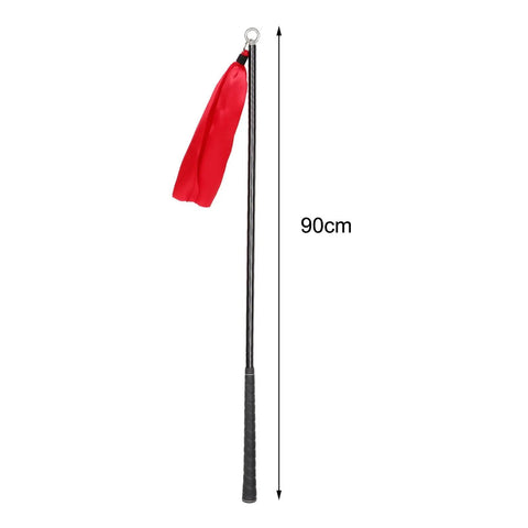 Golf Swing Trainer Tool For Rhythm And Power Boost Warm Up Stick 90cm Practice Aid with red fabric and black grip handle.