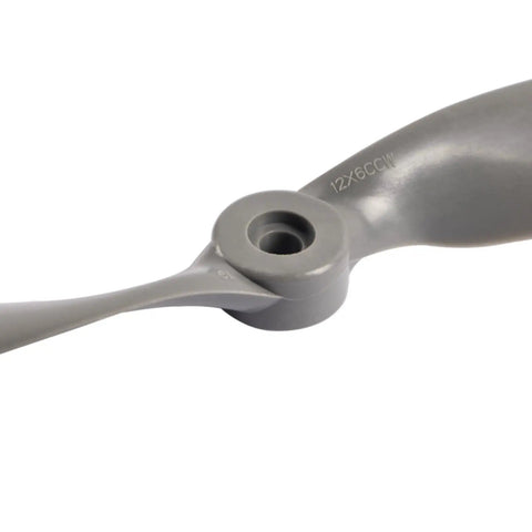 Close-up of a gray 12x6 CCW propeller from 2 Vane Direct Drive Nylon RC Propeller Set in Gray with Adapter Rings for Airplanes Drones Gliders.