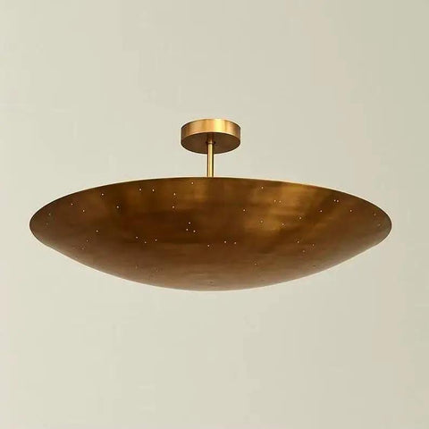 Luxury Handcrafted Brass Pendant Light, Vintage Dome Ceiling Fixture featuring a sleek, wide dome shape and smooth raw brass finish.