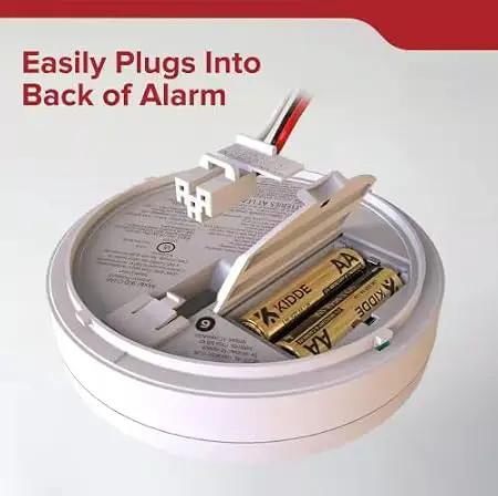 Quick Connect Adapter For Hardwired Smoke And CO Detectors Zero Headache Retrofit Upgrade Kit No Rewiring Required Plug And Play Safety Solution To Smoothly Upgrade Your Existing Alarm System Today, showing easy plug-in design.