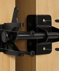 Heavy‑Duty Self‑Locking Automatic Gate Latch, Black Security Hardware for Wood and Metal Yard & Garden Fences mounted on wooden fence with screws