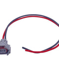 Gray electrical plug with red and black wires from Four Piece Fuel Injector Connector Kit Plug And Play Quick Disconnect Pigtails For Mazda Mitsubishi