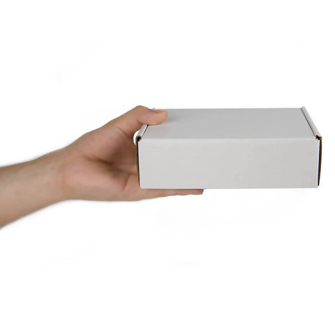 Self Locking White Corrugated Shipping Boxes Pack Of 25 Easy Fold Mailers For Small Business lightweight box held in hand.
