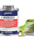 Bostik Never-Seez regular-grade anti-seize lubricant can, 8 oz brush-top, copper/graphite EP compound, beside 1 green lizard.