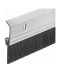 Close-up of a Two By Thirty Six Inch Extra Aluminum And Brush Door Sweep Silver Finish for draft busting and energy saving.