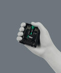 Hand holding Tool-Check Modular Set Imperial 1 Bundle With Micro 1 Hex-Plus L Key Adapter visible against gray background.