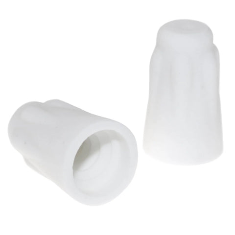 Two white ceramic wiring caps; front view shows hollow interior, side view.