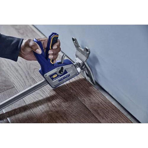 IRWIN Quick-Lift construction jack side view; blue-handled handheld lifting tool with gray metal body.