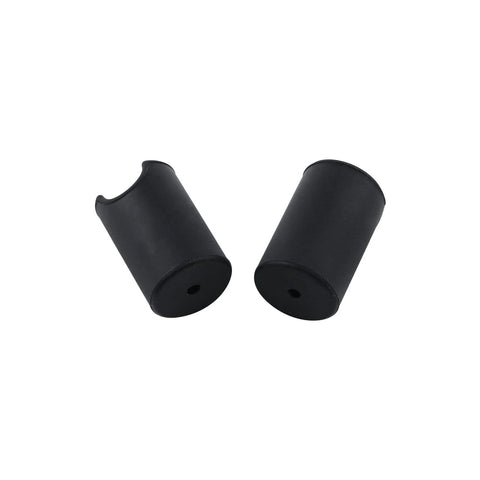 Two black silicone cabinet handle protectors from 12 Pack Round Silicone Cabinet and Door Handle Protectors Black Food Grade Durable Covers