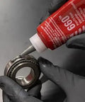 Applying Shop Grade Automotive Press Fit Repair Adhesive For Worn Parts With High Strength Quick Cure to a bearing, 50 ml bottle