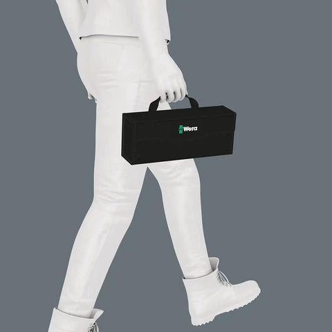 Person carrying 2Go 3 Tool Box Grab And Go Portable Tool Organizer Case for Bits and Drivers, illustrative setting.