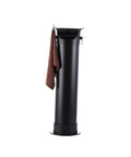 Ridiculously Slick Vertical Espresso Knock Box For Coffee Pucks And Grounds, Spill Safe Design Keeps Counter Pristine, Includes Disposable Bags And Wiping Cloth, Dope Barista Home Setup Essential In Matte Black with cloth hanging.
