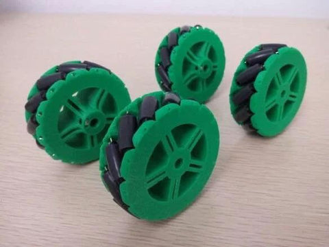 Four green 64mm 3D-printed Mecanum wheels with black rubber tires for a DIY robot car