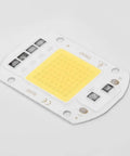 LED COB Chip Floodlight Bulb 20W 30W 50W 220V Input High COB chip with yellow light surface on white base for outdoor lighting.