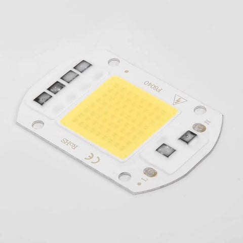 LED COB Chip Floodlight Bulb 20W 30W 50W 220V Input High COB chip with yellow light surface on white base for outdoor lighting.