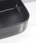 Close-up of USZWBY Vessel Sinks Bathroom Vessel Sink Black Ceramic Countertop Basin showing the smooth edges and finish.
