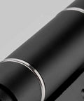 Close-up of Invisible Door Hinge With Hydraulic Self Closer and Adjustable Damping Speed in sleek black finish.