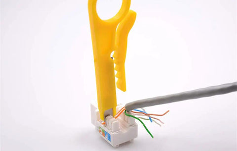 Three Pack Handy Network Wire Stripper Punch Down Cutter For RJ45 Cat5 Cat5e Cat6 Data Cables And Telephone Cables UTP Cable Easy To Use Do It All Tool For Stripping And Punchdown in use with data cable and connector.