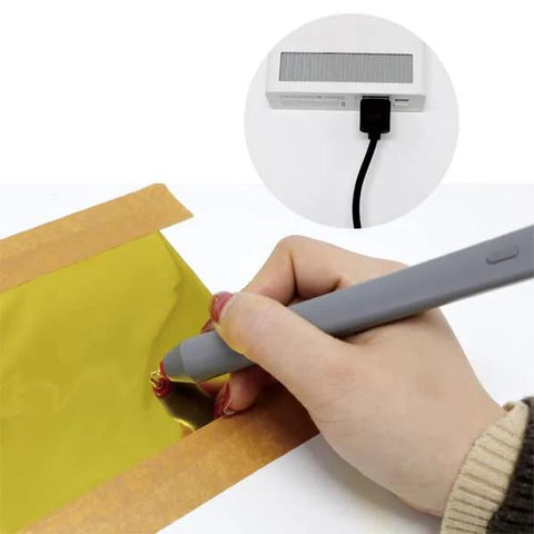 Find Scrapblooms Foil Quill Pen Starter Kit, gray USB-powered foil pen with 4 metal tips applying gold foil