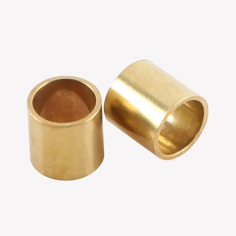 Close-up of two copper sleeves from 2M GT2 Timing Belt Kit for 3D Printers Hot Upgrade 6mm Wide 2mm Pitch Flexible PU Belt With 6 Copper Sleeves