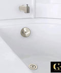 Top Shelf Single Hole Bathtub Overflow Drain Cover Plate With Brushed Nickel Finish installed in a modern bathtub.