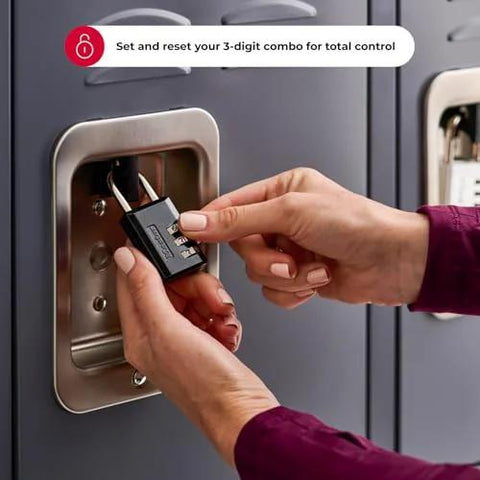 Master Lock black combination padlock — front view on locker hasp, hands adjusting the 3-digit code.