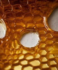 Close-up of hexagonal pattern depicting nonstick surface, suitable for Terpene-Resistant PTFE Roll for Chef-Grade Kitchens and Lab Precision Extractions.