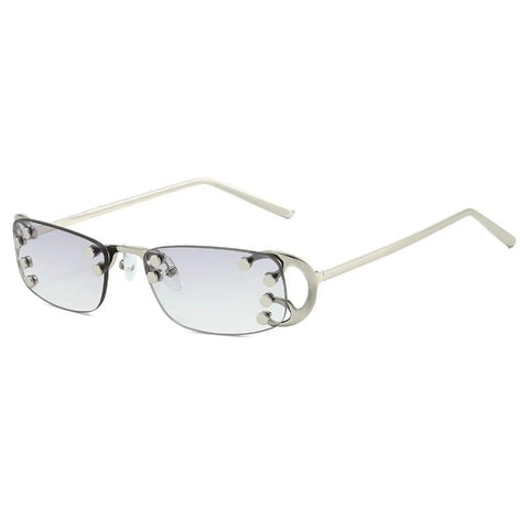 Totally Chic Rimless Women Sunglasses With Dope Silver Metal Frames Featuring Clean Lightweight Rectangle Shades That Bring Major Summer Vibes To Any Fit, silver rimless design, geometric cut, UV shaded lenses.