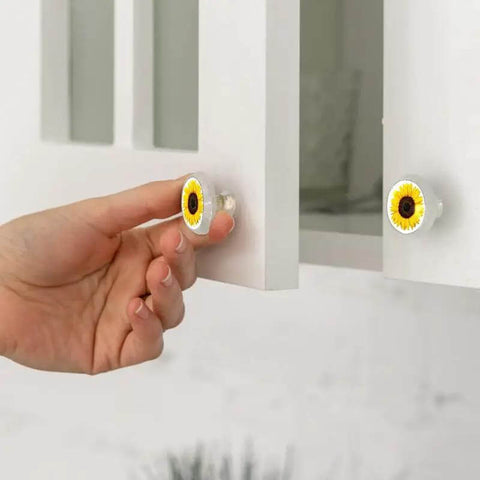Snag Up These Fresh Transparent Round Cabinet Knobs, Tight 1.37 Inch Single Hole Drawer Pulls For Dresser Doors And Kitchen Cabinets, Killer Sunflower Pattern, Clean Home Upgrade, Four Pack close-up of hand installing knob