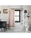 Modern bathroom featuring Bulletproof Cable Bath Drain With Polished Brass Finish And Modular Tub Assembly against white tile.