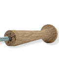 Side view of a 3 Inch Oak Hardwood Shaker Peg with Screw On Hanger Bolt for Hanging Arts and Crafts DIY Woodworking, showing sanded oak grain.