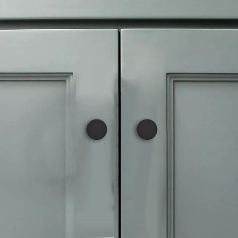 18 Pack 1-1/5 Inch Matte Black Round Cabinet Knobs Zinc Alloy Heavy Duty Pulls shown on grey cabinet doors