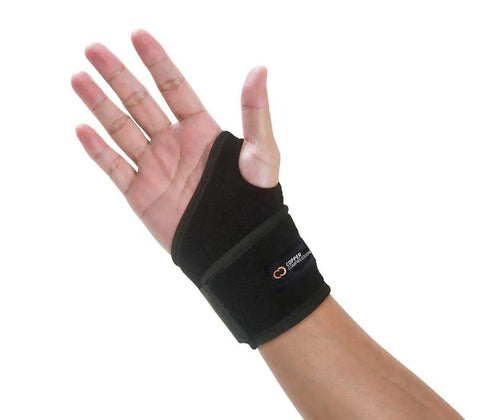 Infused Copper Wrist Wrap For Pain Relief And Support All Day Comfort Adjustable Orthopedic Strap shown on left hand, black color.