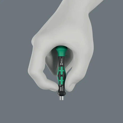 Hand holding a Micro Bitholding Screwdriver With 4 mm External Hex Drive, ergonomic handle and anti-roll cap visible