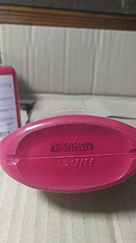 Base of a bottle labeled Loctite, showing manufacturing details, part of Blue Medium Strength Threadlocker For Metal Nuts And Bolts That Locks Them Down And Prevents Vibration Loosening 360 Degree Fahrenheit Maximum Temperature 250 Milliliter Bottle For Industrial And Home Projects packaging.